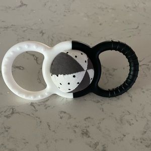 Lovevery silicone rattle with removable ball that jingles